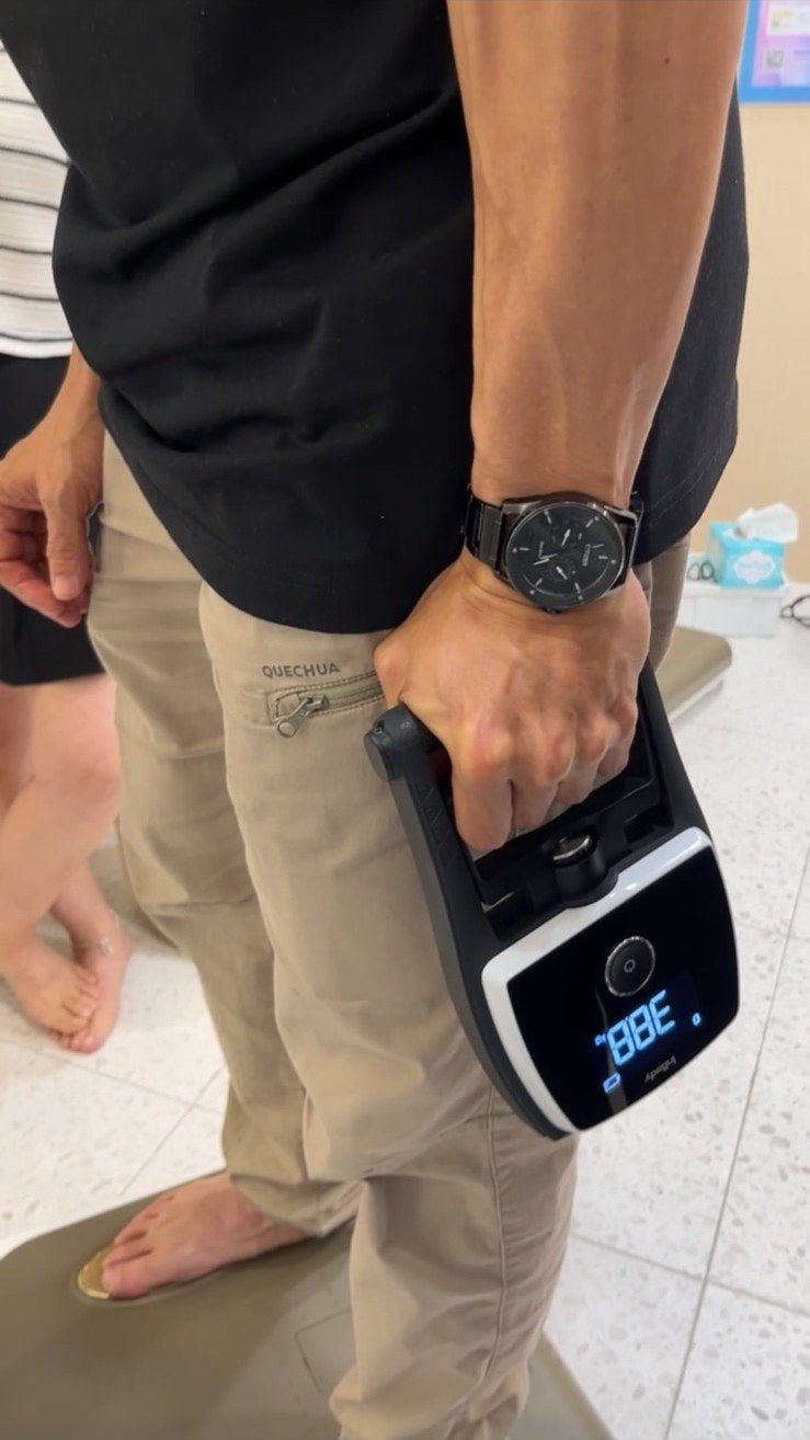 Grip strength assessment in progress